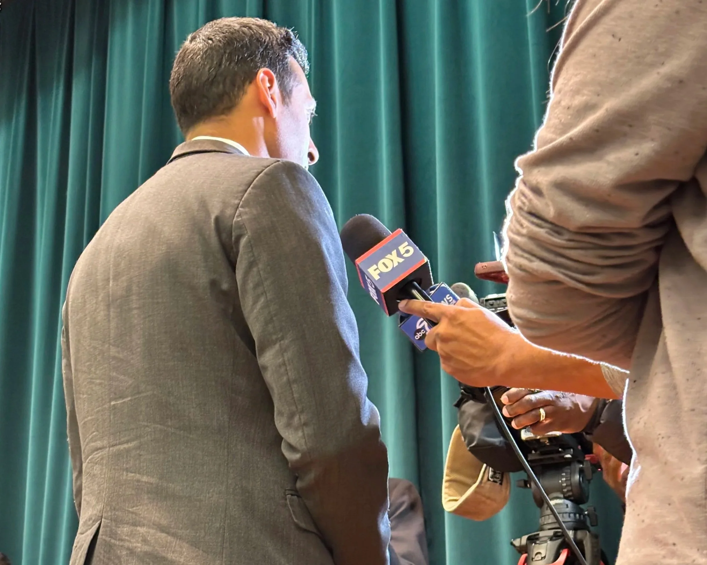 Media interview at a community event